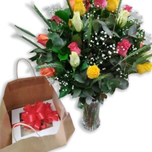 Mixed Roses in a Vase with a Cake
